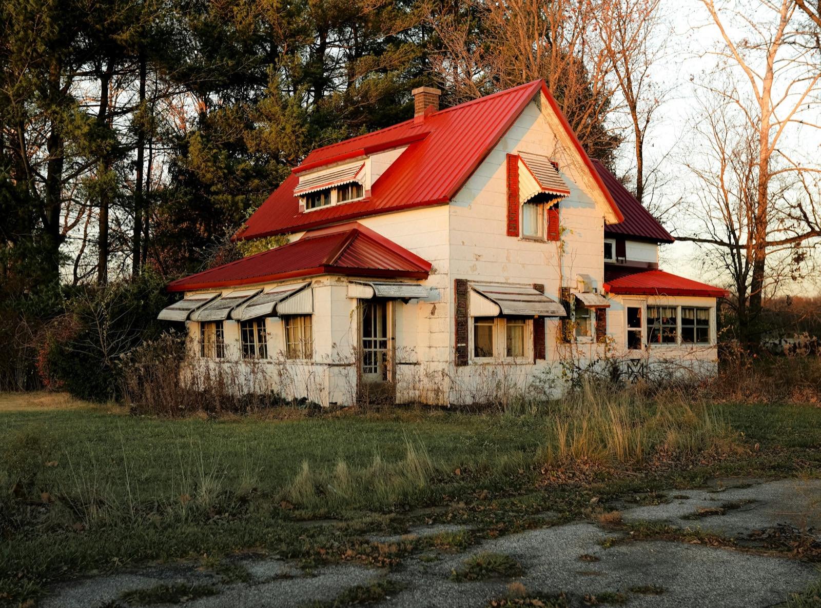 Rural farmhouse surrounded by fields